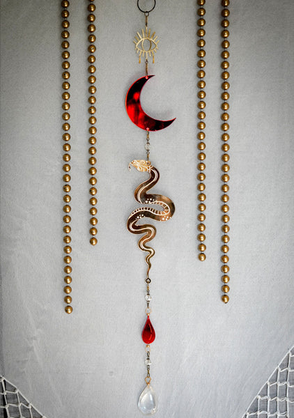 Snake Charmer Blood Moon Suncatcher